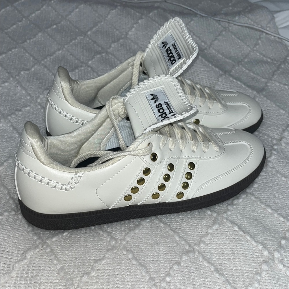 White Sneakers with Gold Accents